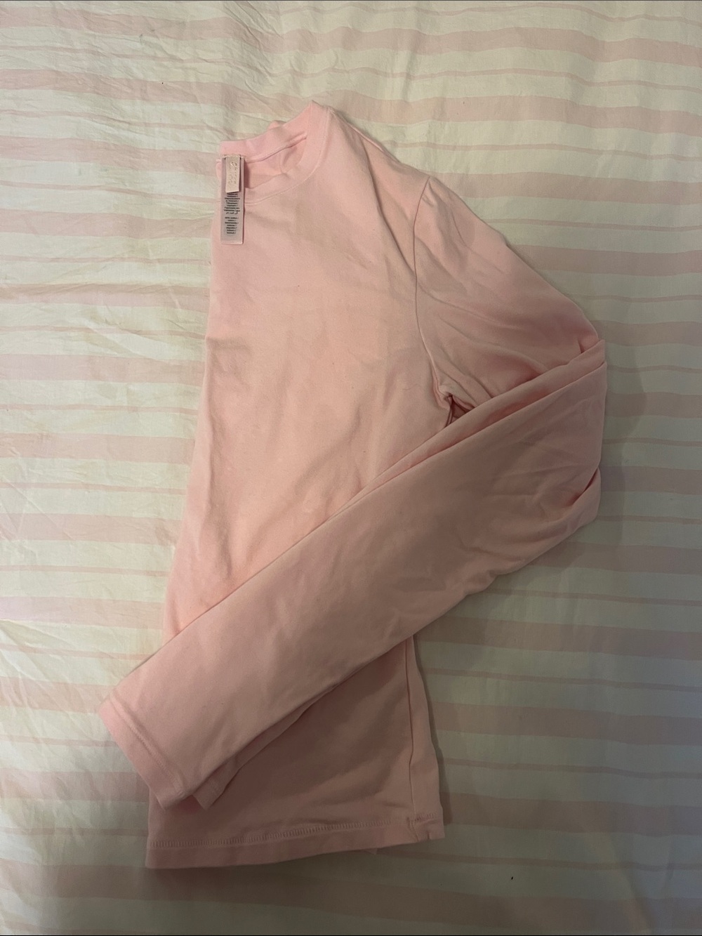 Skims light pink long sleeve